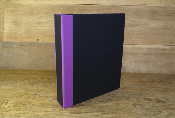 black folder with purple edges